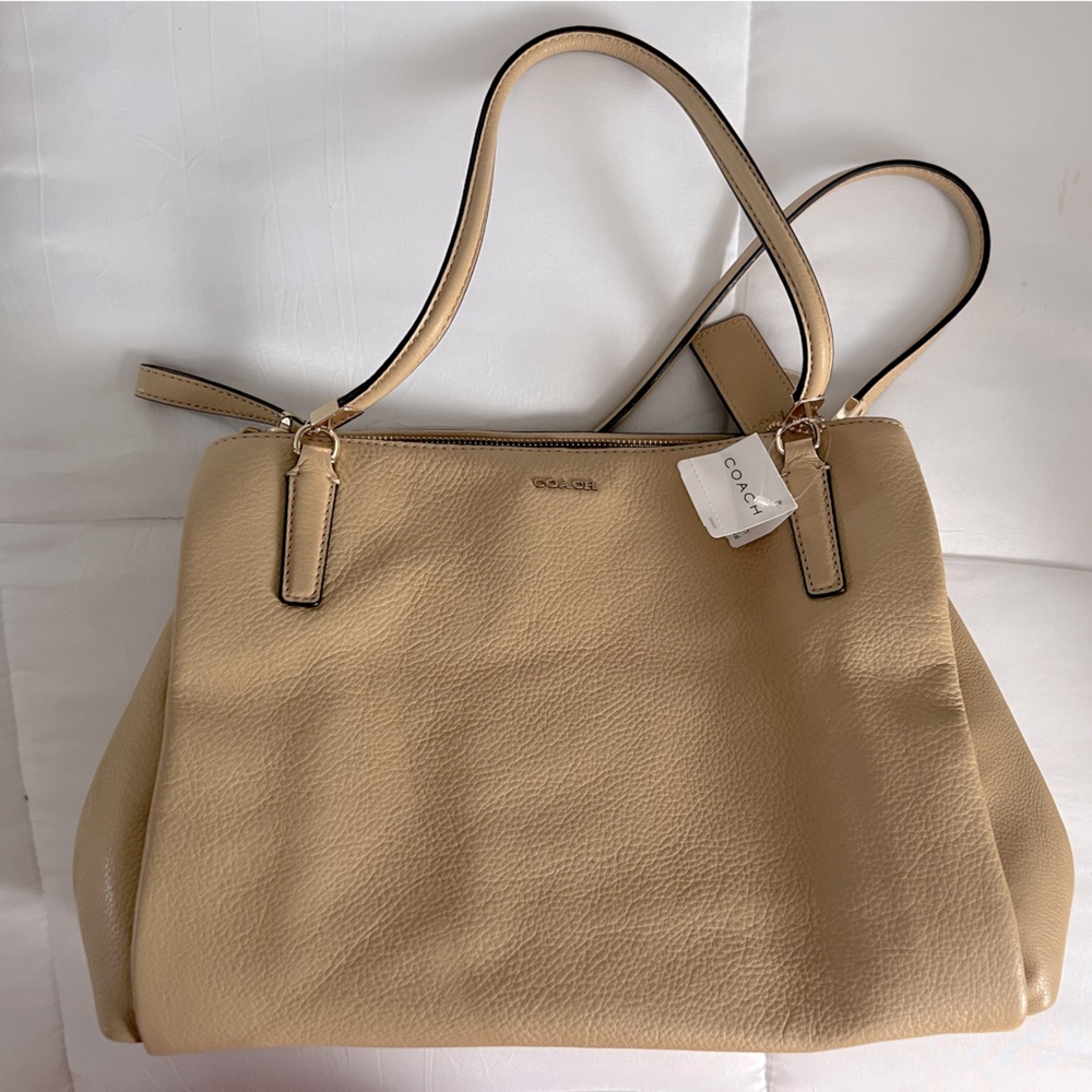 Coach hand bag, new - never used. Like new condition.